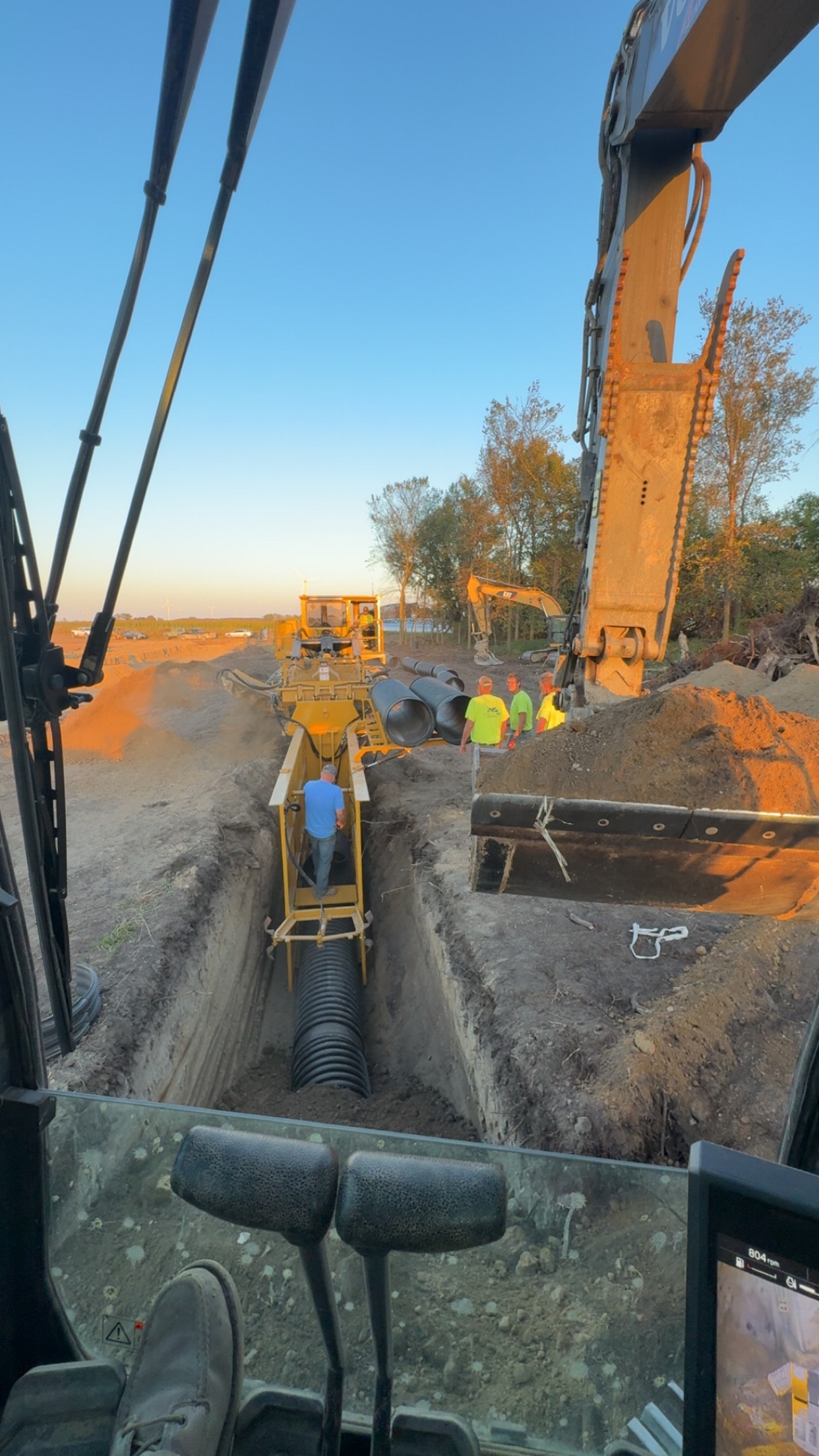 Welke Ag pipeline and drainage installation at golden hour